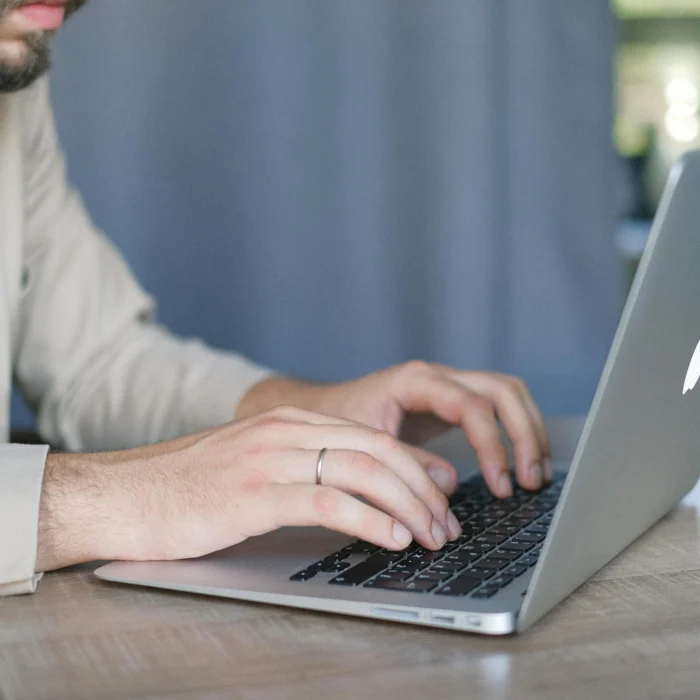 Real estate team reviewing analytics dashboard focused on how seo helps foreclosure and short sale specialists reach motivated clients